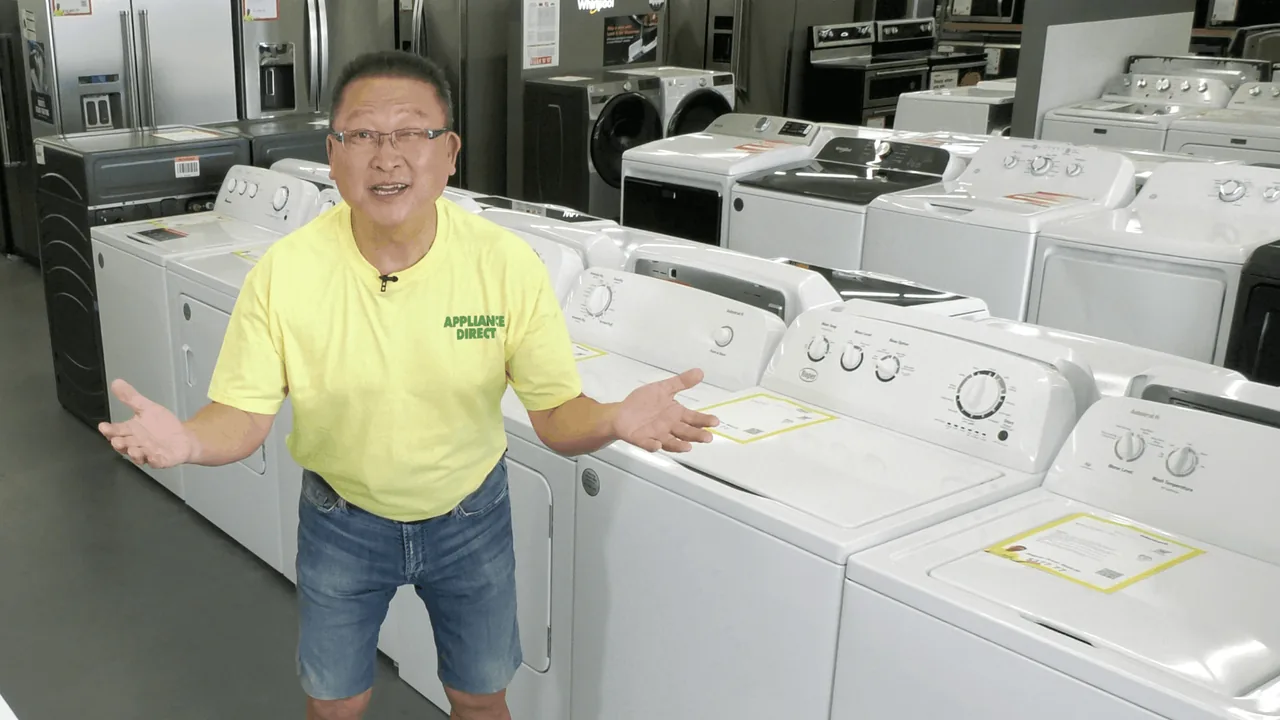 Sam Pak in the Appliance Direct showroom-rows of washers, dryers, and refrigerators